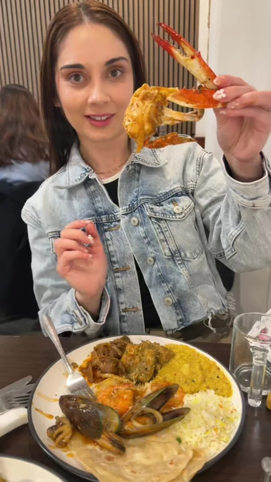 Claire trying a seafood buffet at Mr. & Mrs. Chefs in Palmerston North